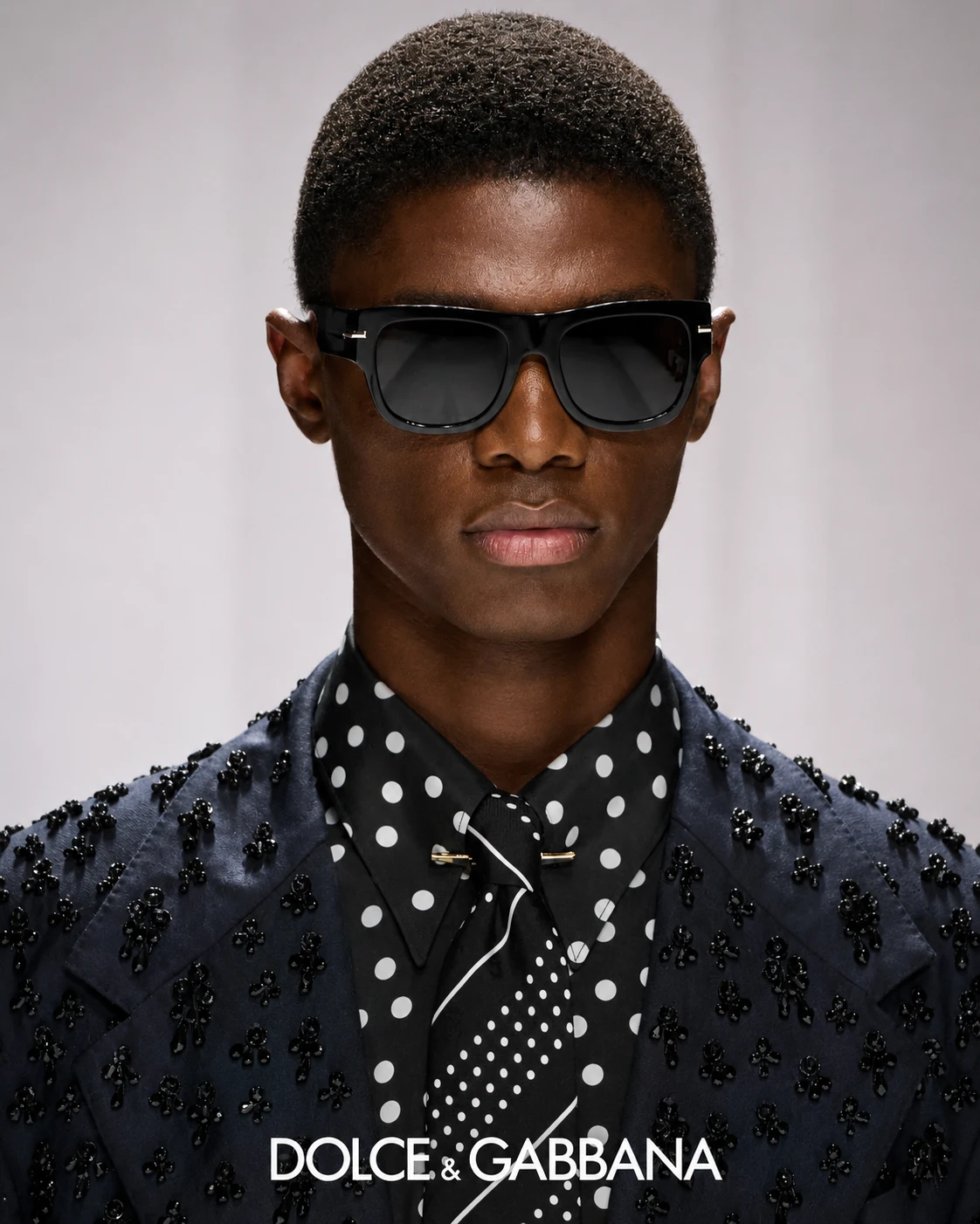 Man wearing Dolce & Gabbana sunglasses.