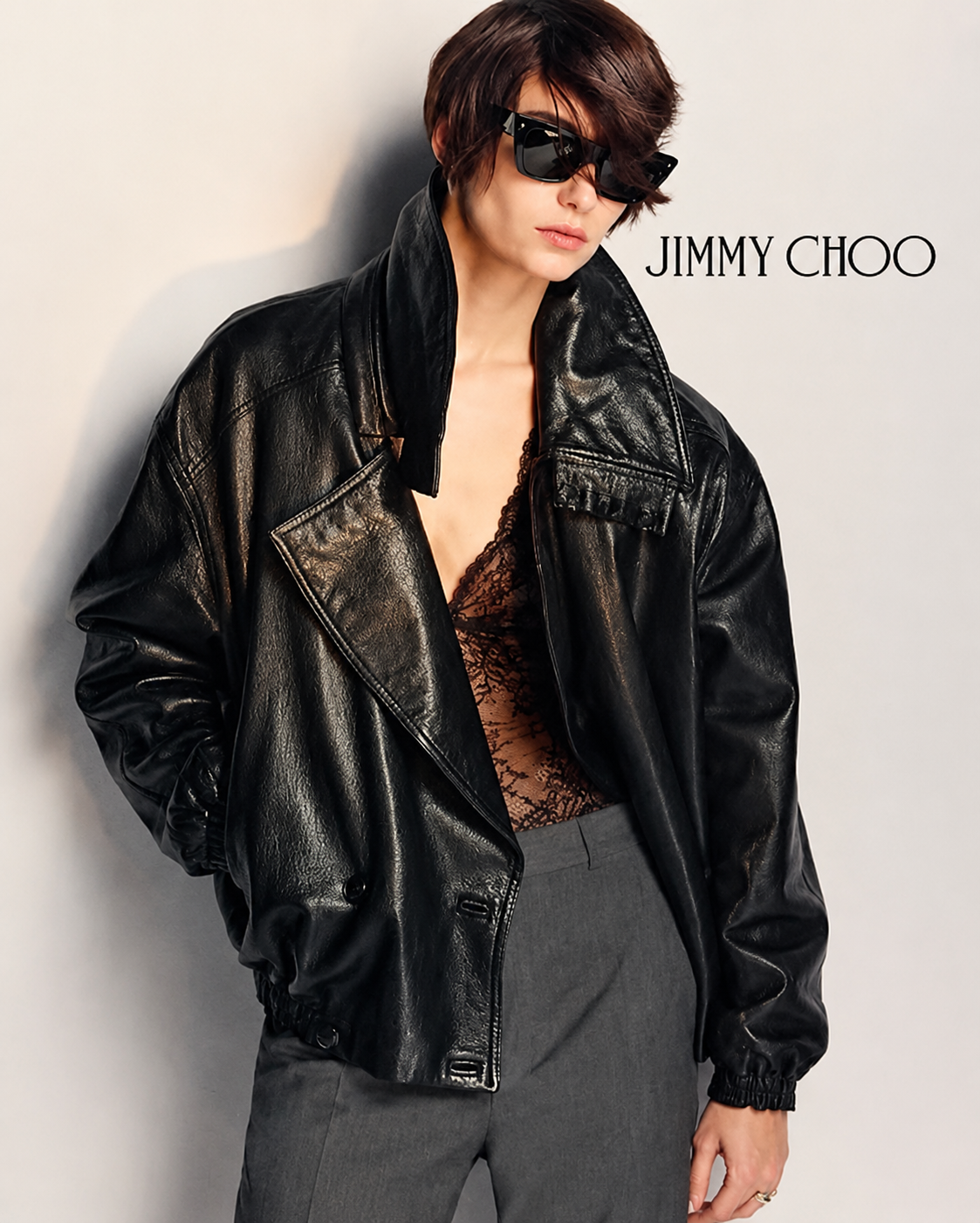Woman model wearing Jimmy Choo sunglasses.