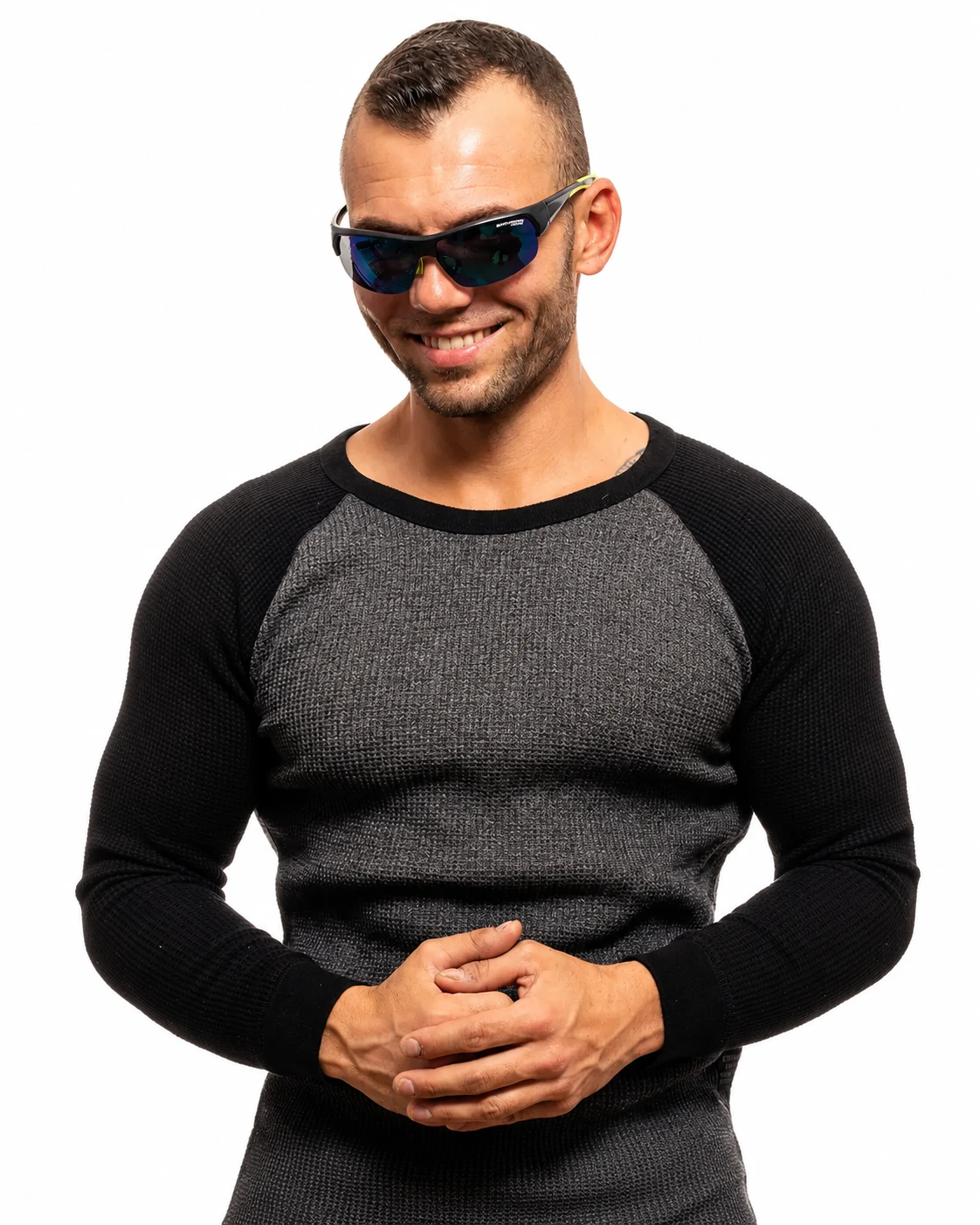 Man wearing Skechers sunglasses.
