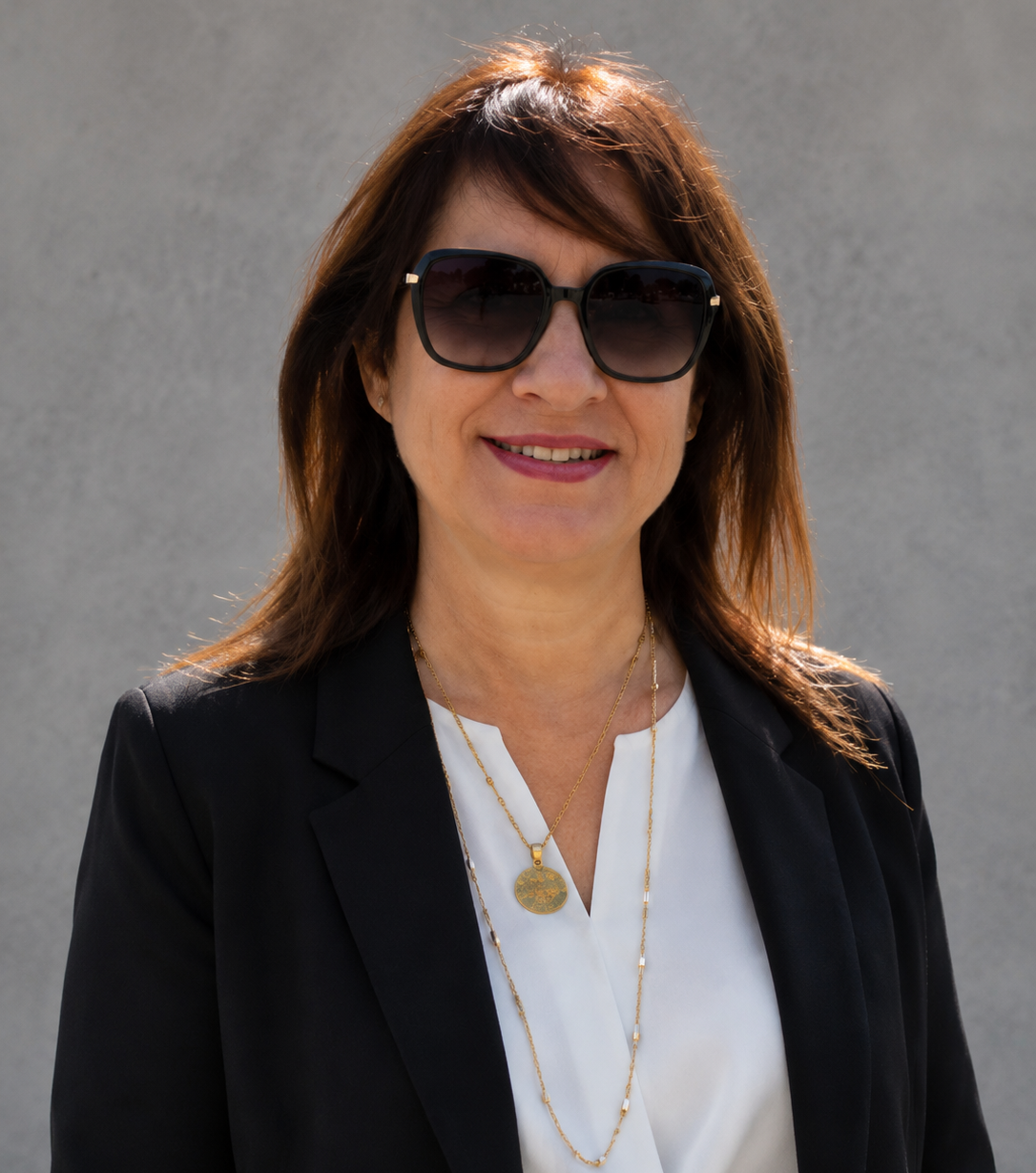 Portrait of Mary Pilasa, certified optician and optometrist, co-founder of The Optical Technology Centre in Limassol