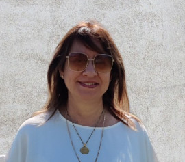 Portrait of Mary Pilasa, certified optician and optometrist, co-founder of The Optical Technology Centre in Limassol