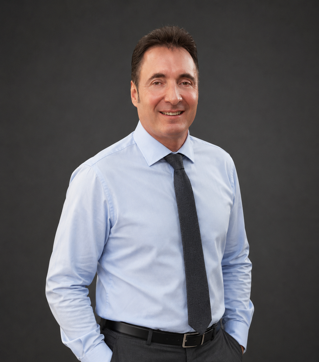 Portrait of Panicos Pilasas, certified optician and optometrist, co-founder of The Optical Technology Centre in Limassol