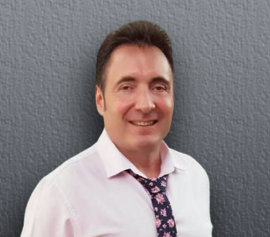 Portrait of Panicos Pilasas, certified optician and optometrist, co-founder of The Optical Technology Centre in Limassol